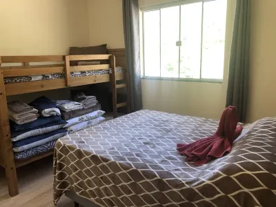 Casa de Praia e Campo com Piscina Hotel dekat Gamboa Beach