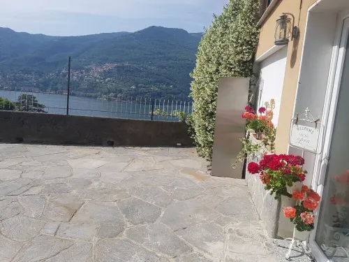 From the apartment and terrace view of the Lake, and with private parking space