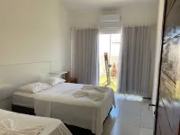 Casa com Piscina e Jardim, a 400m da Praia de águas quente. Aceita seu animal. Hotels in Touros