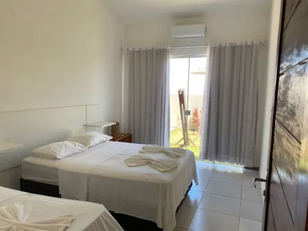 Casa com Piscina e Jardim, a 400m da Praia de águas quente. Aceita seu animal. Отели в г. Touros