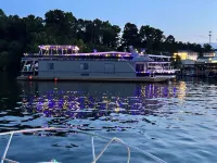 Stunning 3-bedroom house boat in Charlotte with optional cruises available.