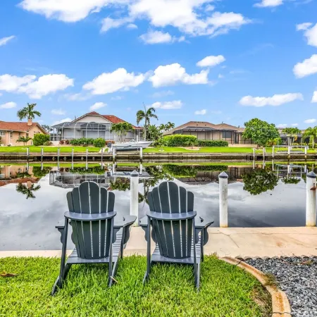 WOW! Luxury Punta Gorda waterfront home; HEATED POOL, golf community; WOW factor