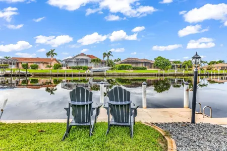 WOW! Luxury Punta Gorda waterfront home; HEATED POOL, golf community; WOW factor