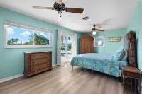 Waterfront Home with a Large Dock, Pool, and Deck Area. Can Accommodate Pets.