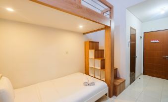 Comfort Studio Room with Bunk Bed at Dave Apartment