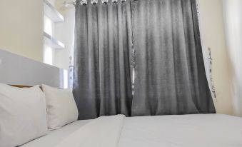 Homey and Comfy 2Br at Vida View Apartment