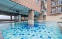 RedLiving Apartemen Tamansari Panoramic - Rasya Room