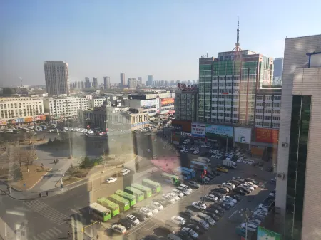 Dan Jie Chengxin Short-term Apartment (Zhanqian Street) Отели рядом с достопримечательностью «Kuixing Building»