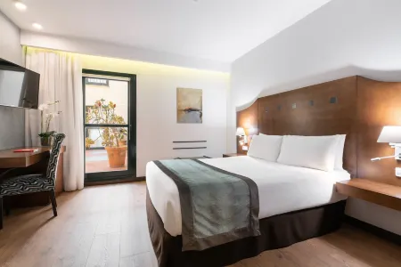 Exe Agora Cáceres Отели в г. Касерес