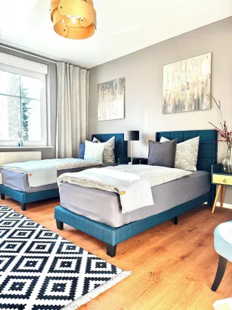 Haus Gitta Ferienwohnung Отели в г. Тельтов-Флеминг