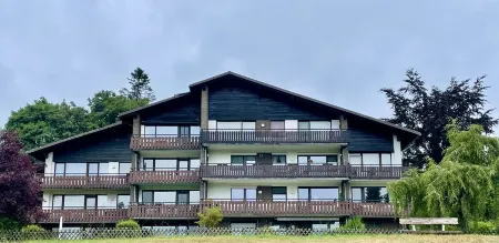 Cozy 5 star apartment with a dream view. Hiking trails and bathing lake nearby.