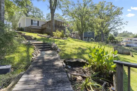 Family - Friendly Lakefront Home with a Covered Boat-slip.