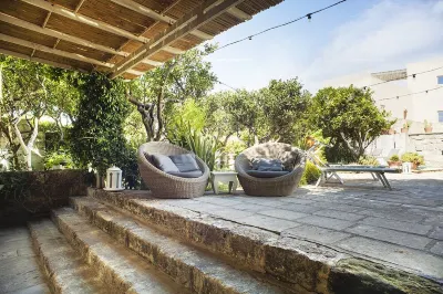 Discover "Locanda Fiori di Zagara", an 18th-century historical residence in Diso Hotel a