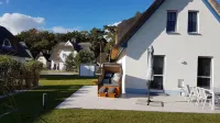 "Käptn 9a" thatched-roof villa with 105 sqm, sauna, fireplace, beach chair, double parking space
