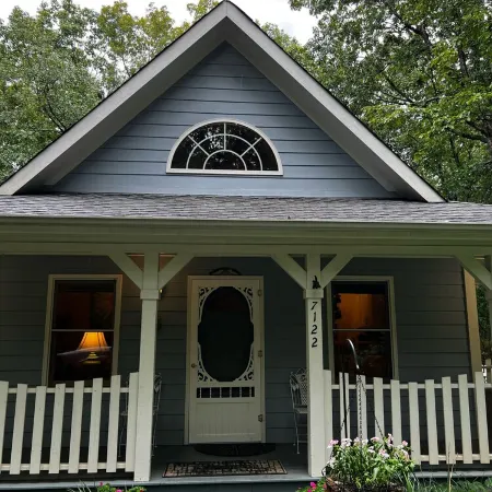 The Blue Cottage located in the woods on Lookout Mountain in Rising Fawn GA