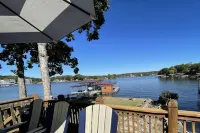 Lakefront cabin, large private dock, & flat backyard oasis. Panoramic views!