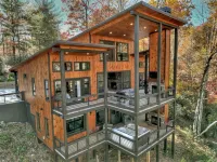 Modern 4BR Cabin w easy access, hot tub & a view!