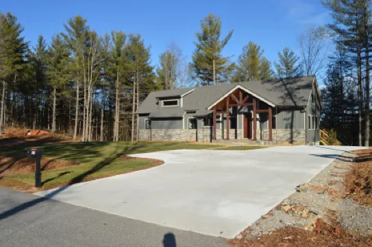 Lovely lakefront home with dock. Summertime stunner. Winter wonderland nearby.