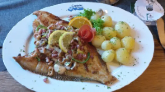 Fantastically beautiful living under thatch in 1a location of Greetsiel