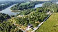 Porch-lovers Paradise! SLEEPS 11-12. Multiple fire pits. Only 0.8mi to boat ramp