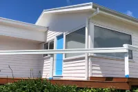 Beach House with Bay of Fires views, featuring 2 bedrooms with ensuite bathrooms