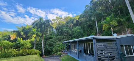 NEW -The Sugar Shack, Ocean views over cane fields from your outdoor Spa Bath