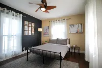 A beautifully renovated private home with a large backyard, Pool, and Hot Tub