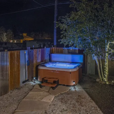 We have A/C! Relax in the hot tub! modern design, family and pet friendly!