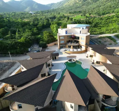 The Qualia Resort Club & Brewery Hotels near Shree Shakti Peeth Idana Mata Temple