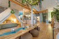 Experience Stay at the Glamping Loft Lake Geneva |Group Stays |12 Stylish Tent Suites |Kitchen & Bar Hotels in Lake Geneva