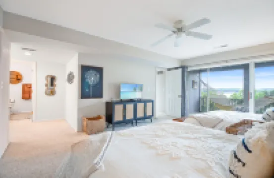 Two Balconies and Community Pools - Stunning Lakefront Haven