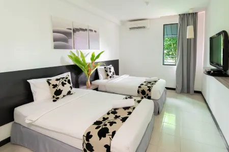 Riverra Inn Langkawi Отели рядом с достопримечательностью «Wat Koh Wanararm Langkawi»
