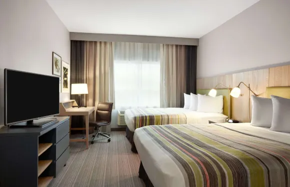 麥克多諾江山旅館&套房酒店