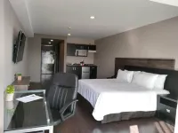 Elite 47 Hotel & Suites Hotels near Arcos Bosques Tower