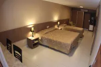 Amuarama Hotel Hoteles cerca de Ohana Garden
