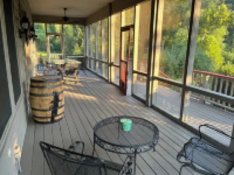 Spacious family home on the banks of the Little Red River in Heber Springs AR.