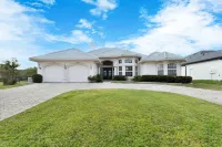 Ultimate Open Waterfront Home Sailboat Gulf Access  Heated Pool Hotels in Cape Coral