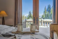 Charming 3-bedroom log cabin with Hot Tub and fitness room in delightful Big Sky - Balkon