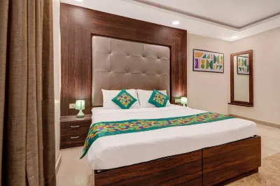 Treebo Riddhi Paradise - 15 Mins from Airport Hotels near Charbagh Railway Station