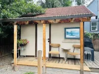 Welcome to the charming Gnome Home, your cozy retreat in the heart of Vernon!