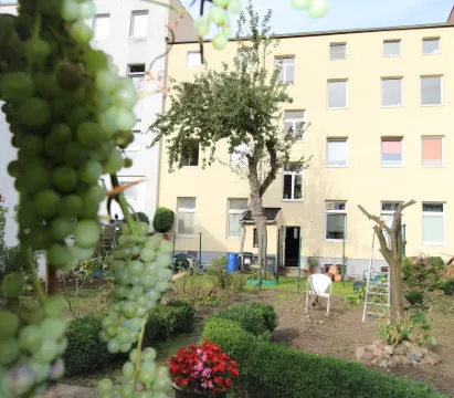 Ferienwohnung im Zentrum mit Gartennutzung