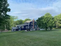 NEW LISTING! Cozy Country Farmhouse with Hot Tub