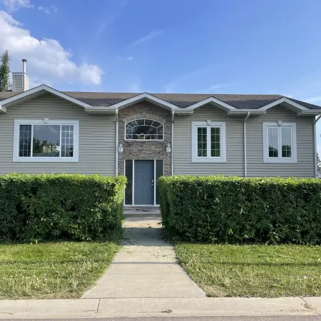 Spacious bungalow with large backyard and garage close to West Ed Mall