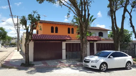 Duplex house with pool, pool and barbecue Santa Monica Beach Guarapari Отели в г. Гуарапари