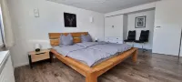 Charming apartment with sauna and large terrace, just a few steps from the beach.
