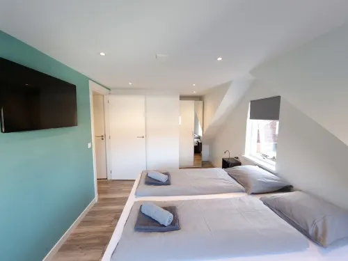 Modern styled holiday home at the base of the dunes, nearby beach and sea!