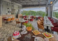 Grand Continent Mysore A Sarovar Portico Affiliate Hotel - Frühstück