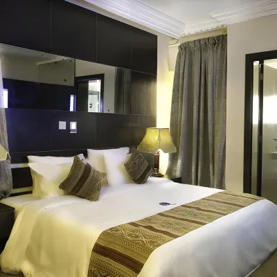 Iec Villa Resort Hotels near African University of Science and Technology