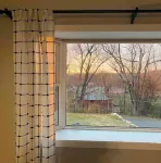 Cheerful two bedroom home in quiet neighborhood. Sun Porch ~ Patio ~  Large yard