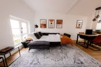 Highlight in Mühldorf - Come4stay Stadtblick - 2 Zimmer Wohnung I bis zu 4 Gäste Hotels in Muhldorf